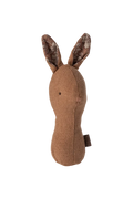 Brown fabric rabbit rattle on a white background