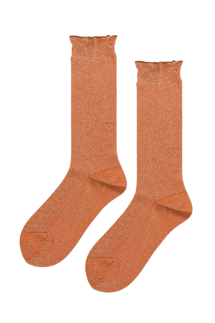 A pair of textured, glittery orange crew socks with ruffled cuffs, displayed against a solid white background.