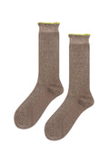 Pair of brown socks with green trim on a white background