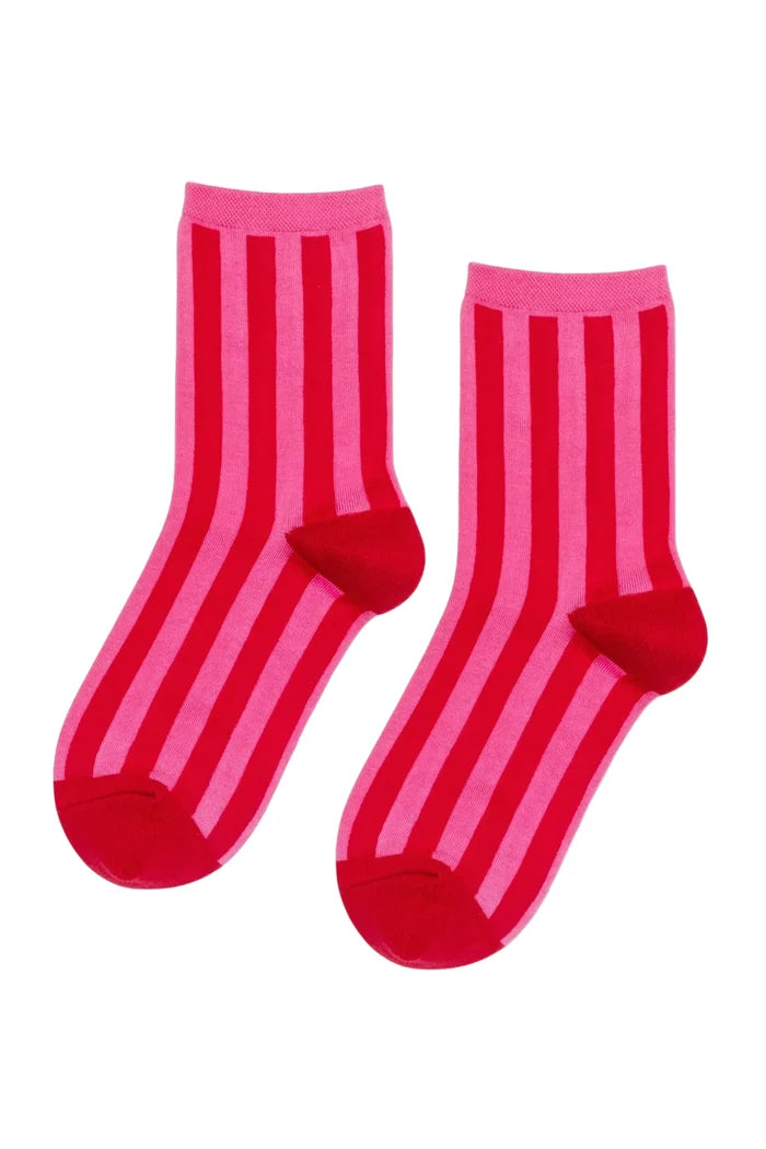Red and pink striped socks on a white background