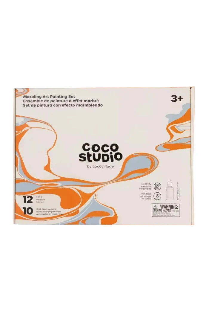 Cardboard box packaging with marbled paint graphics on white background