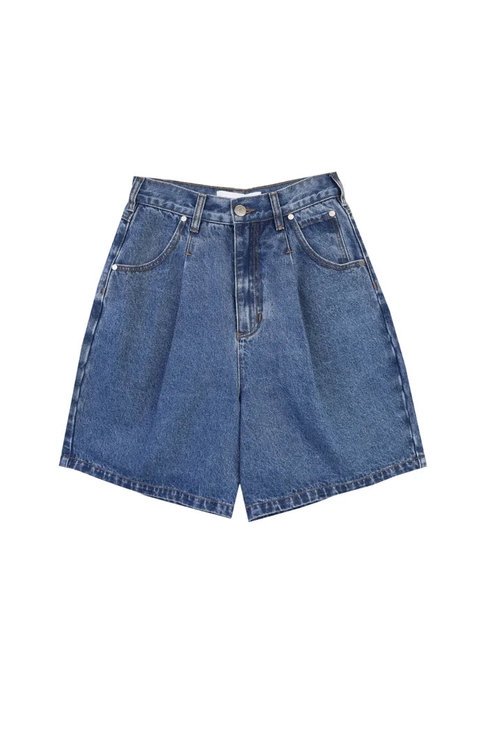 Blue denim shorts on a white background