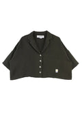 Dark green cropped button down shirt on a white background