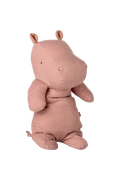 Pink hippo plush toy on a white background