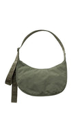 Green cross body bag on white background