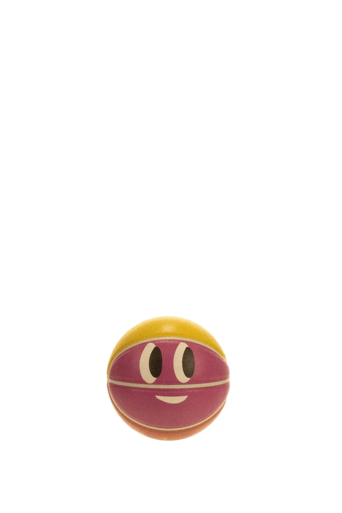 Small ball with a smiley face design on a white background