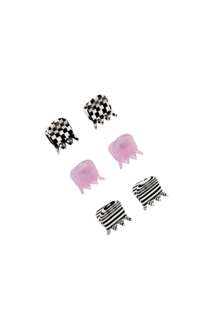 Set of 6 small hair slaw clips with various patterns on white background