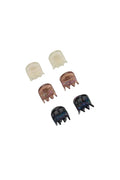 Set of six sparkly micro claw clips on white background