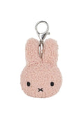 A light pink plush bunny keychain with embroidered black eyes and mouth, attached to a silver metal lobster clasp, shown on a plain white background.
