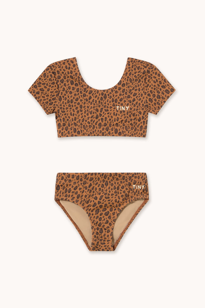 Leopard print swim set with 'tiny' branding on a white background