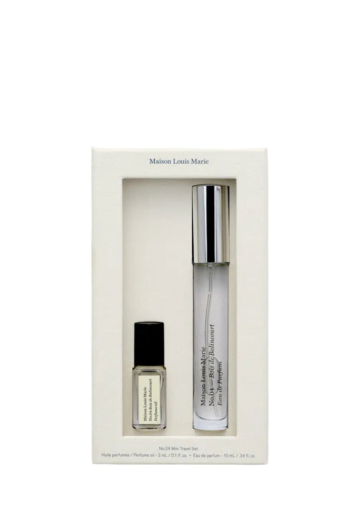 Two small bottles in a white box on a light gray background