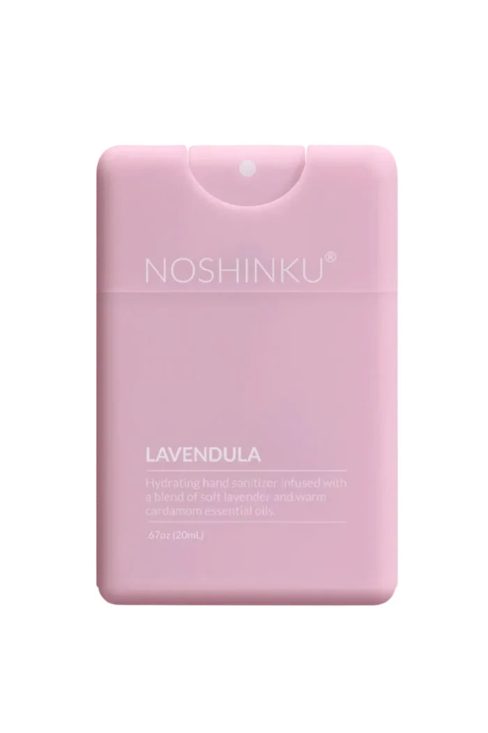 Pink hand sanitizer bottle with 'Noshinku' branding on a light pink background