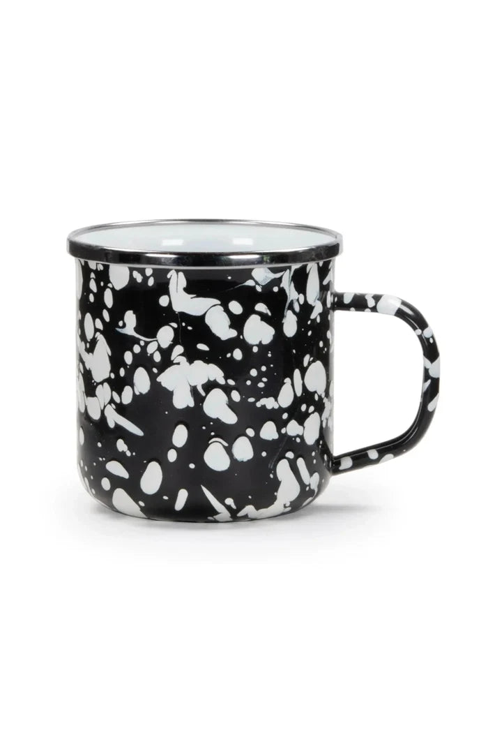 Black and white speckled mug on a white background