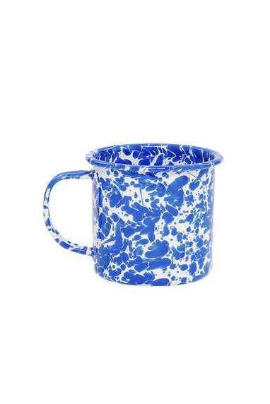 Blue and white speckled mug on a white background