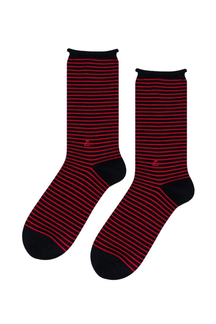 Red and black striped socks on a white background
