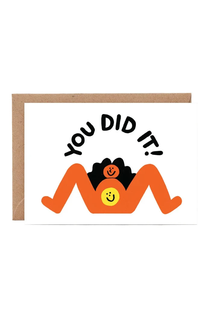 A greeting card with a cartoon woman giving birth and the text "you did it!"