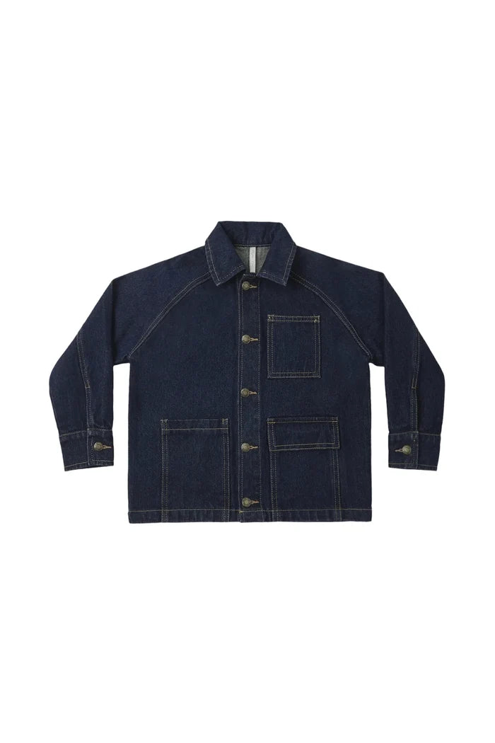 A dark indigo blue denim work jacket with contrast tan stitching, button closures, and a classic collar, displayed flat against a light gray background.
