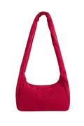 Red puffy purse on white background