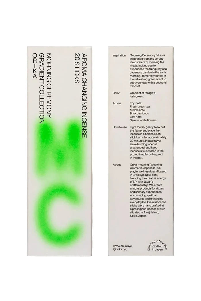 Front and back of a box of incense featuring neon green graphic typography.