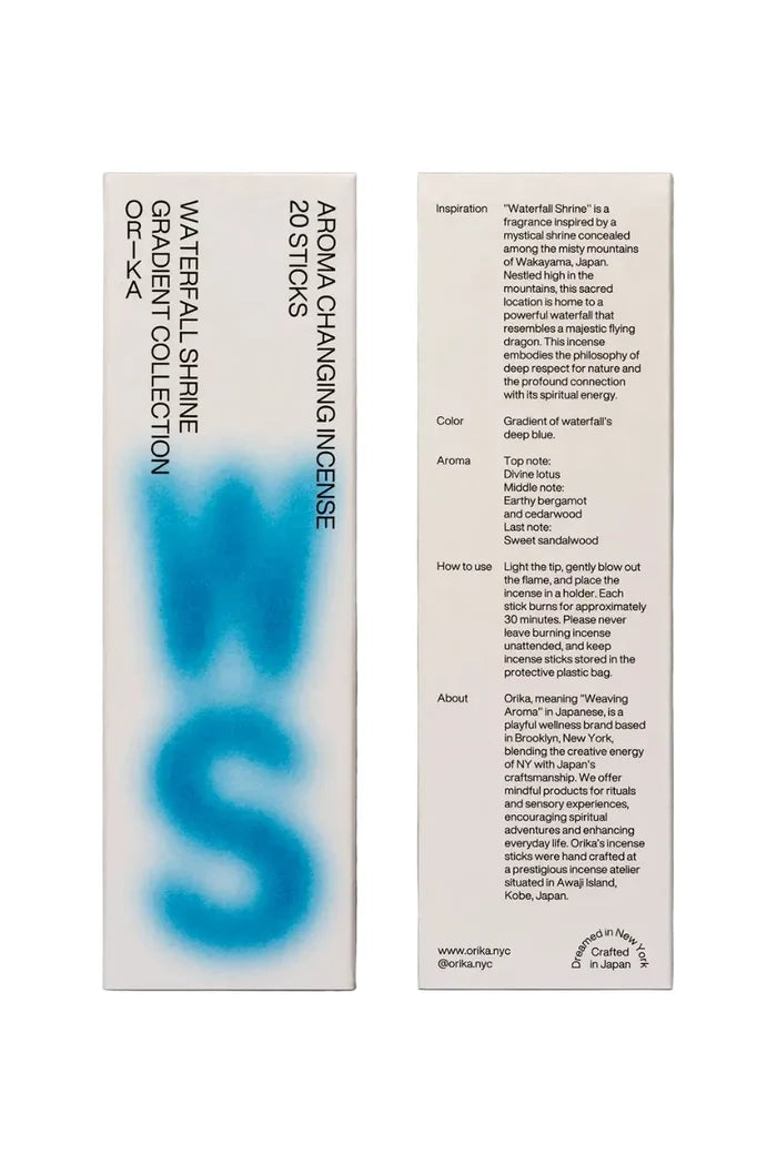 Front and back of incense box featuring blue graphic typography.