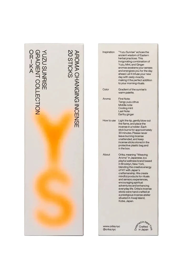 Front and bak of a box on incense featuring graphic orange typography.