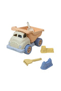 Plastic dump truck set with shovel, rake, and two sand castle molds on white background