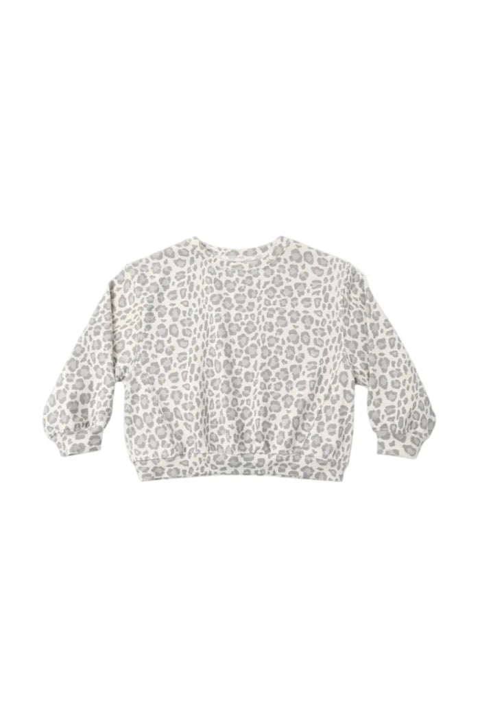 A long-sleeve crewneck sweatshirt featuring a gray leopard print pattern on a cream-colored background, laid flat against a light gray studio backdrop.