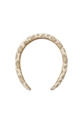 A curved headband with a beige and brown leopard print pattern, shown against a plain light gray background.