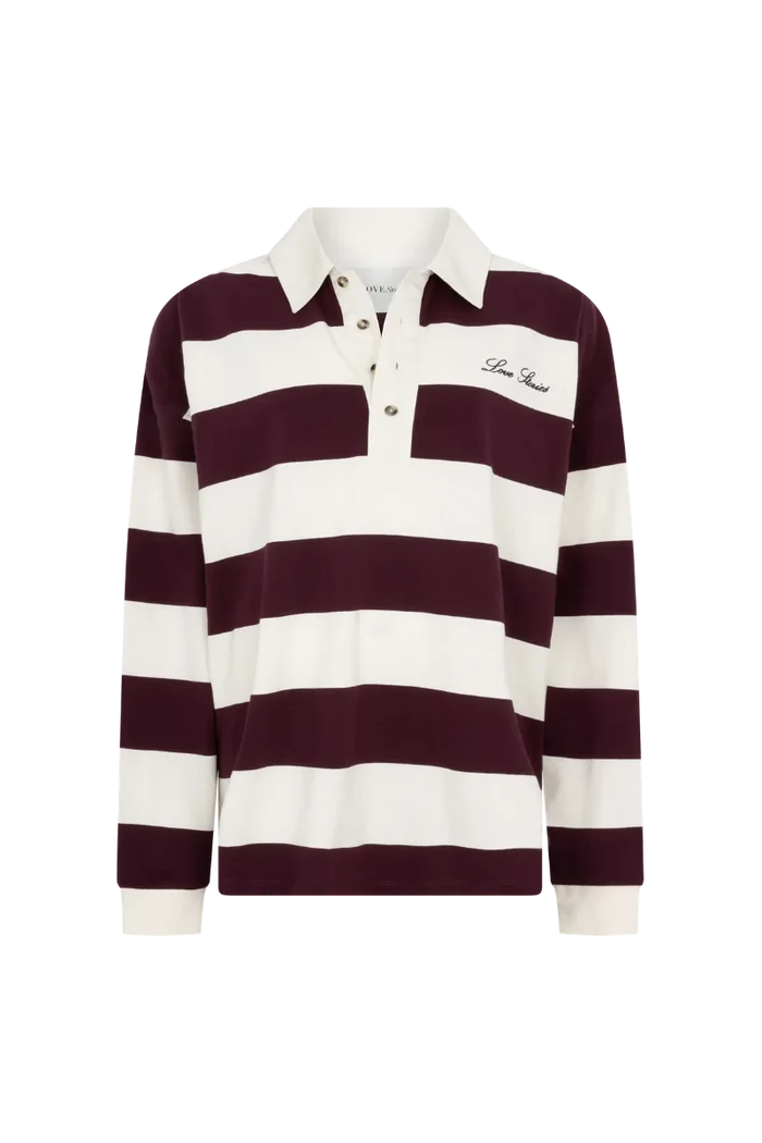 A long-sleeve rugby-style polo shirt with horizontal dark burgundy and off-white stripes, featuring a white collar, three-button placket, and 'Love Stories' embroidered on the left chest.