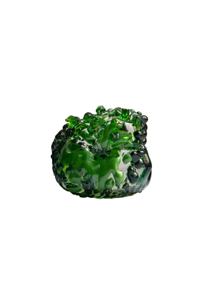 A sculptural green glass object with a bubbly, organic texture, isolated on a solid white background.