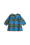 A toddler girl's long-sleeve plaid blouse in blue, green, yellow, and red tartan, featuring a wide decorative collar with black lace trim and gathered cuffs.