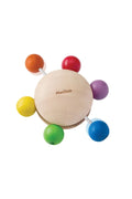 Colorful wooden baby toy with multiple balls on a white background, featuring the PlanToys brand.