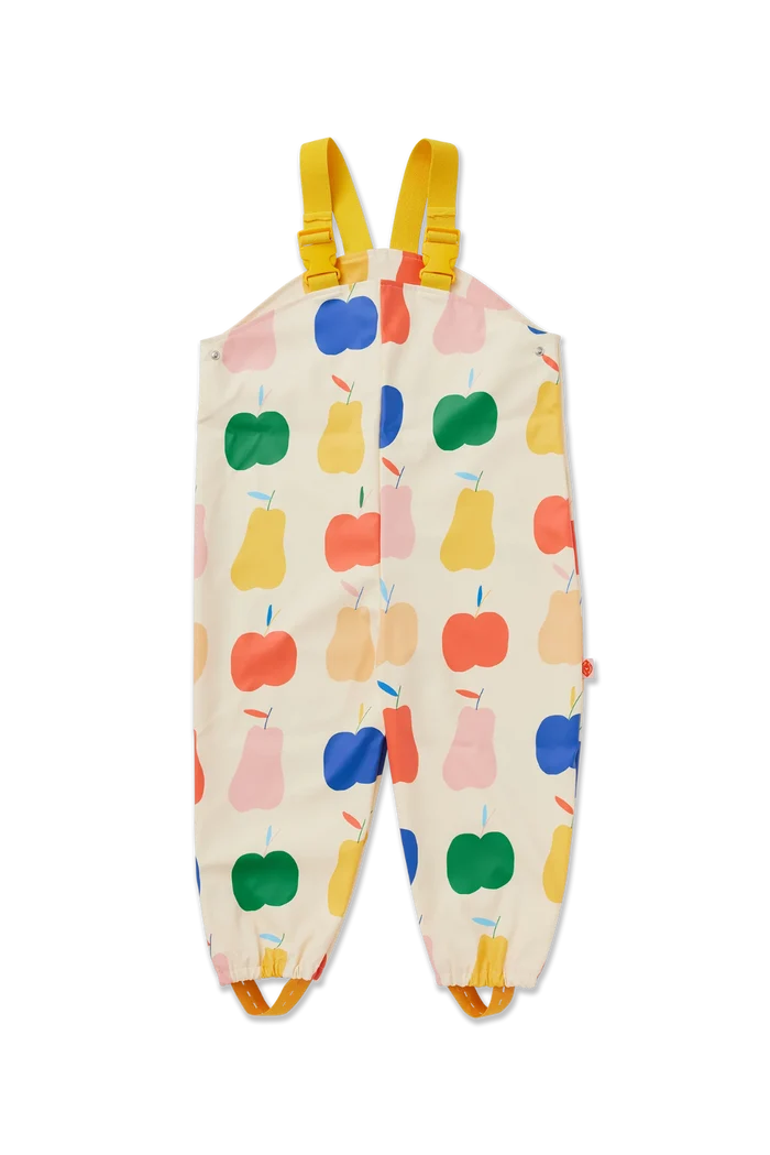 A pair of baby bib overalls with a colorful fruit print, featuring yellow shoulder straps and elasticized leg cuffs, shown flat on a white background.