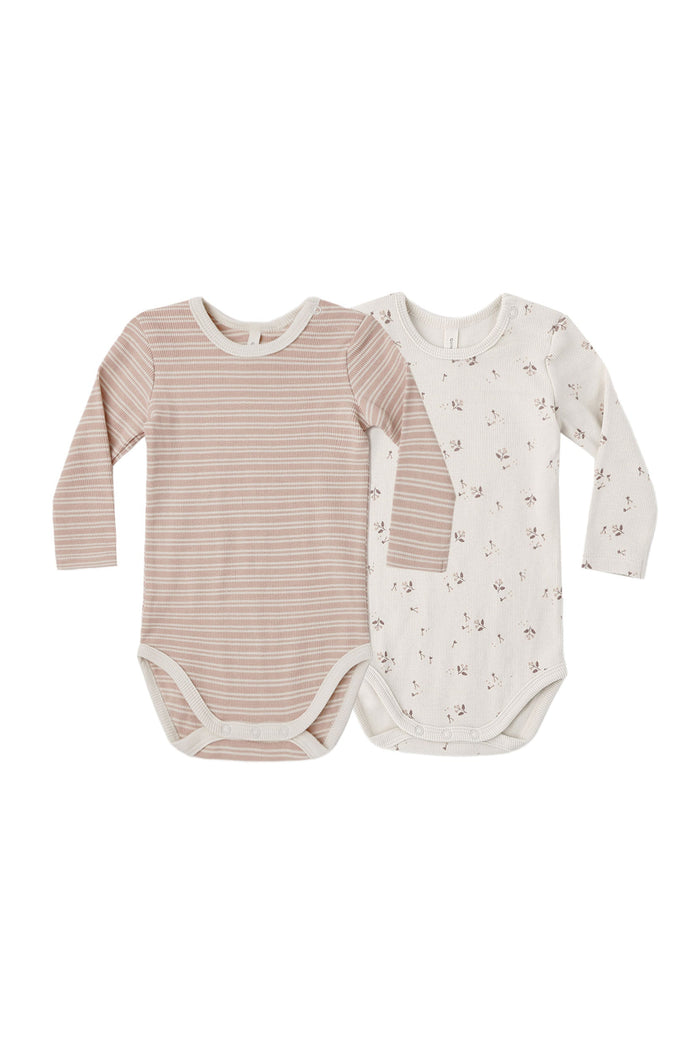 Two baby bodysuits on a white background, one striped and one with a floral pattern.