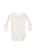 An off-white long-sleeve baby bodysuit with a delicate ruffled collar and a tiny all-over floral print, shown flat on a white background.