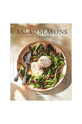 The cover of the cookbook titled 'Salad Seasons' featuring a bowl of salad with vegetables and cheese.
