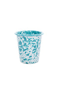 Speckled blue and white cup on a white background