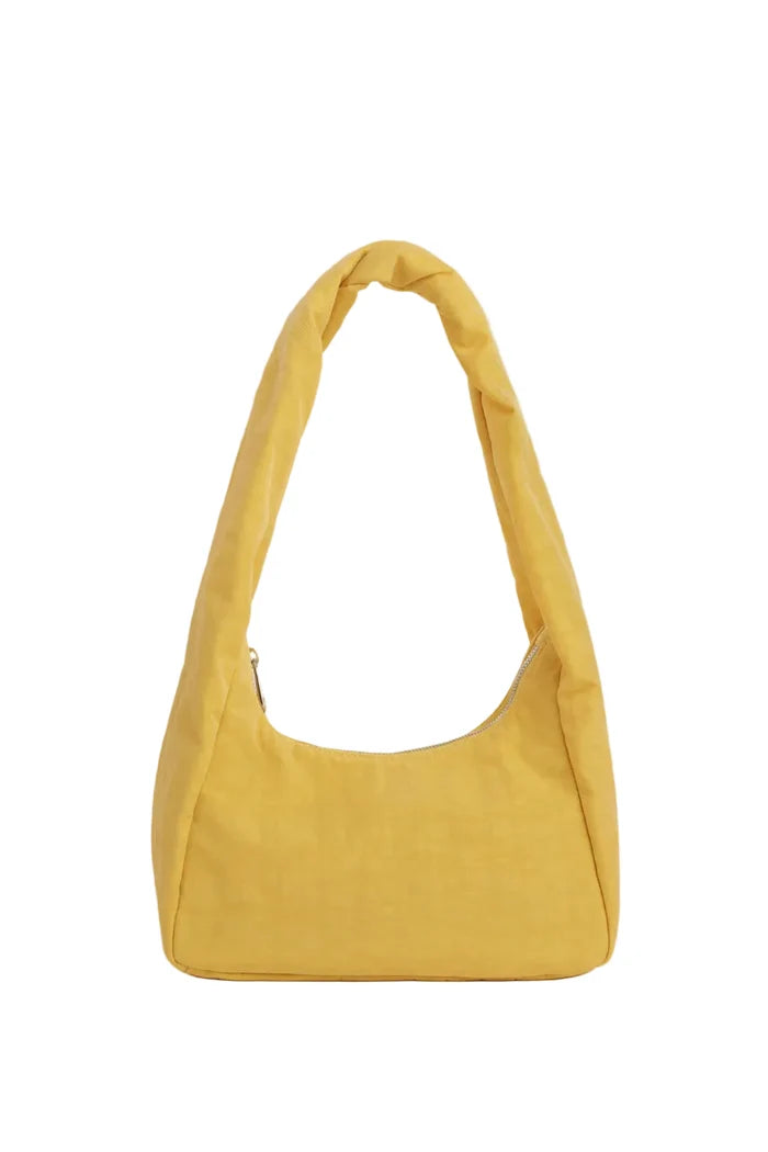 Puffy yellow nylon purse on white background