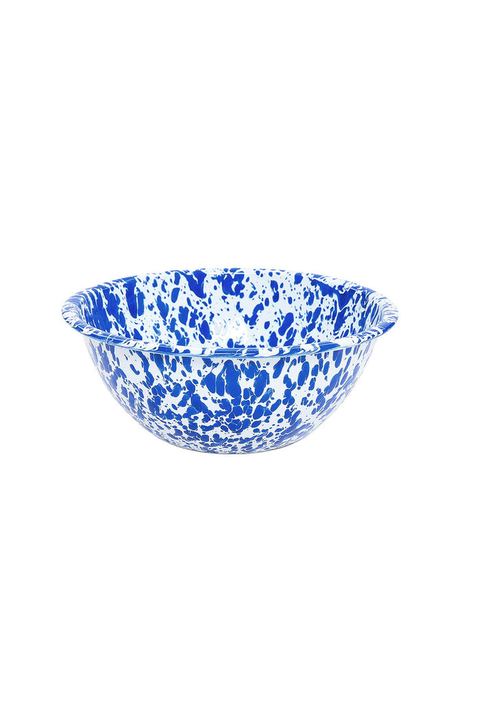 Blue and white speckled enamelware bowl on a white background