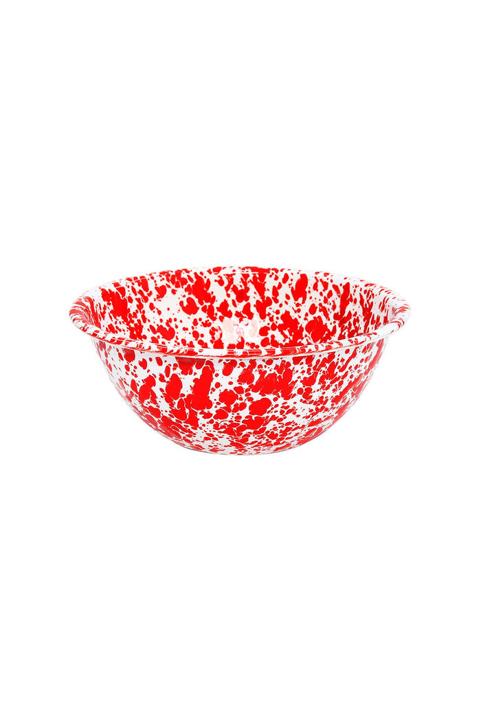 Red and white speckled bowl on a white background