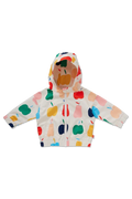 A children's hooded jacket with a colorful fruit print, laid flat on a white background. The pattern features apples and pears in green, yellow, pink, orange, and blue on an off-white base.