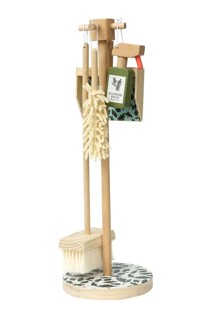 Wooden stand holding wooden cleaning toys against white background
