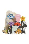 Ocean Stacker Tower wooden toy set with colorful animal cutouts and a beige drawstring bag printed with blue text, shown on a white background.