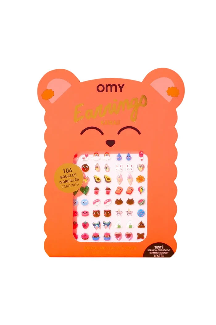 Orange packaging of OMY earrings with a bear design on a white background
