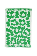 Tea towel with graphic green flower design