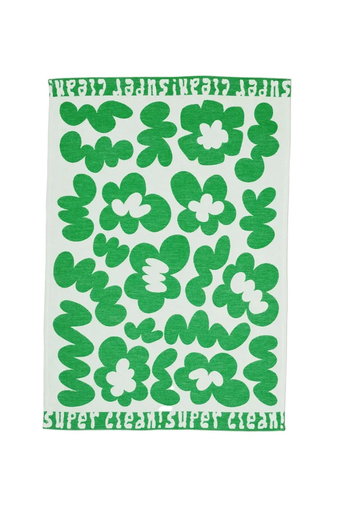 Tea towel with graphic green flower design