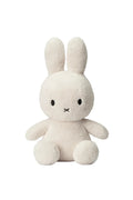 White plush bunny toy on a white background
