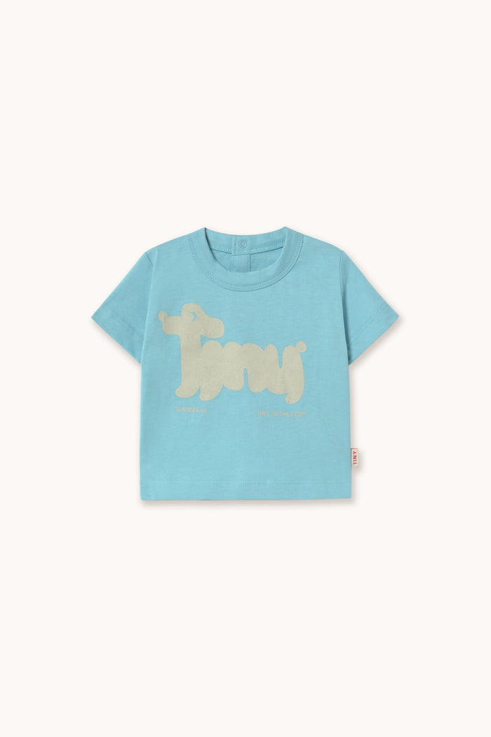 Light blue t-shirt with a dog graphic on a white background