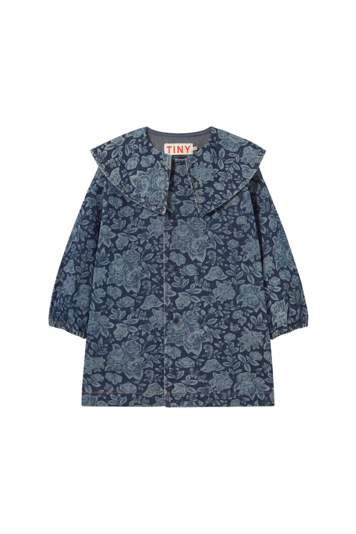 A navy blue floral print coat with a wide collar and long sleeves, shown flat against a light cream background. The brand name 'TINY' is visible on the inner neck label.