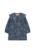 A navy blue floral print coat with a wide collar and long sleeves, shown flat against a light cream background. The brand name 'TINY' is visible on the inner neck label.